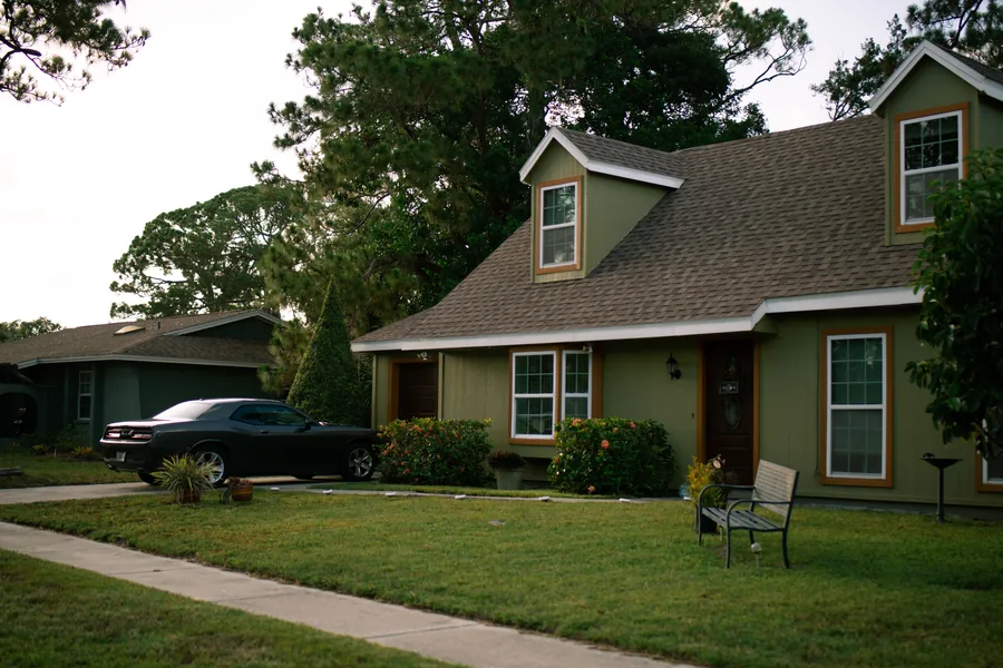 A suburban house with a well-kept lawn